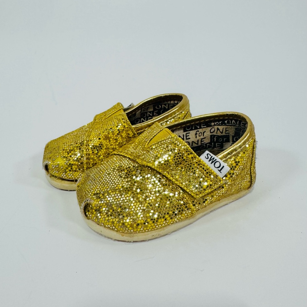 TOMS 2T Yellow Gold Sparkly Toddler Shoes with Velcro Strap.